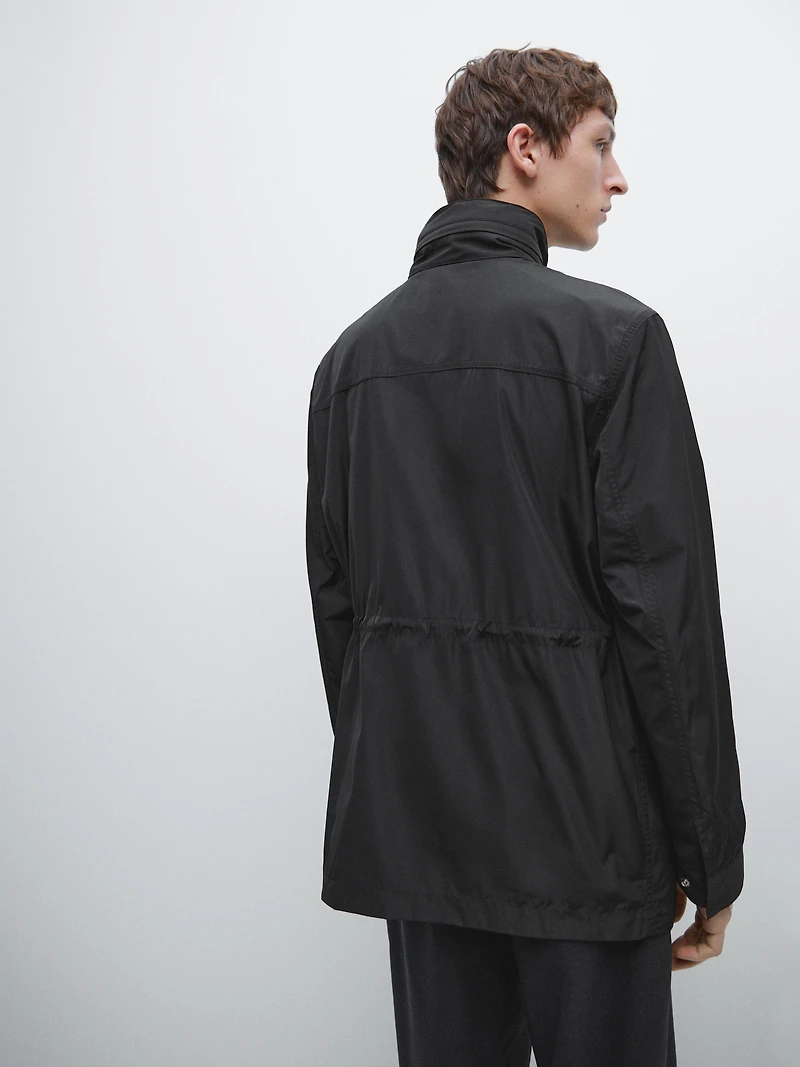 Hooded parka with fabric detail