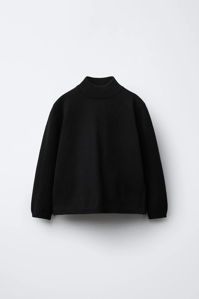 PULL EN MAILLE À COL CHEMINÉE