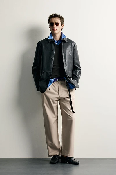 STRAIGHT FIT PLEATED PANTS