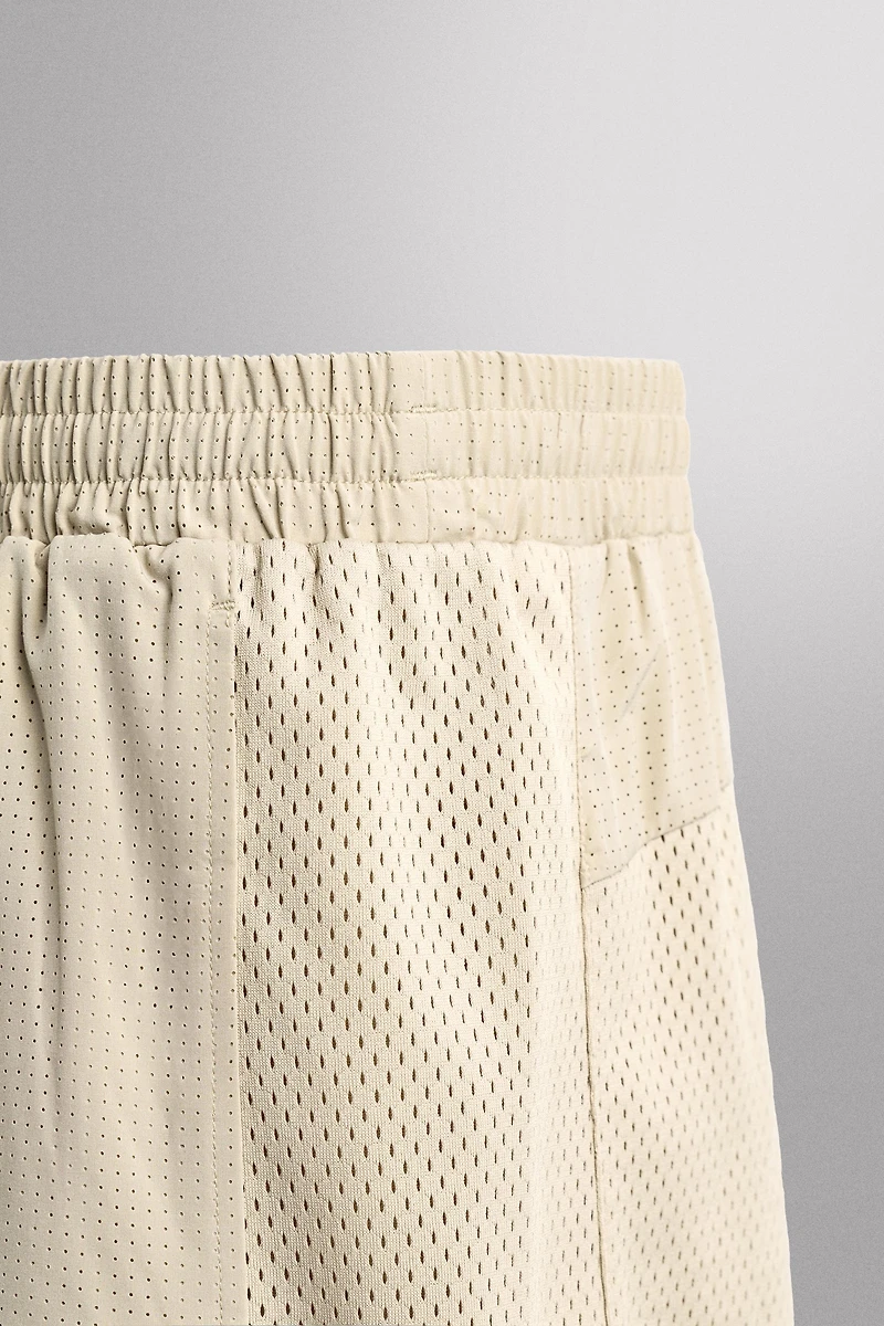 COMBINED PERFORATED SHORTS