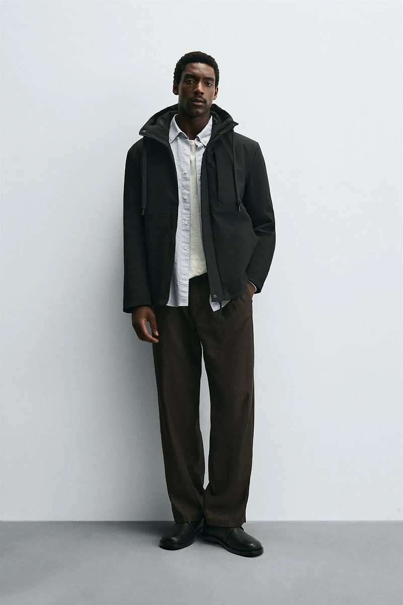 HOODED TECHNICAL JACKET