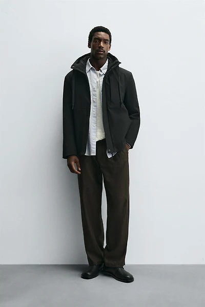 HOODED TECHNICAL JACKET