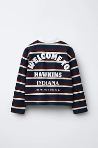 STRIPED STRANGER THINGS © NETFLIX POLO SHIRT