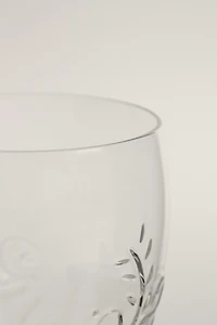 RAISED FLORAL DESIGN GLASS TUMBLER