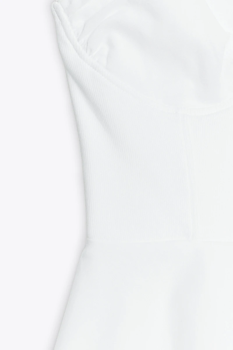 PEPLUM MIXED TOP