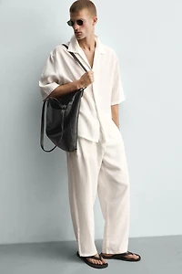 PANTALON FLUIDE À PLIS LATÉRAUX