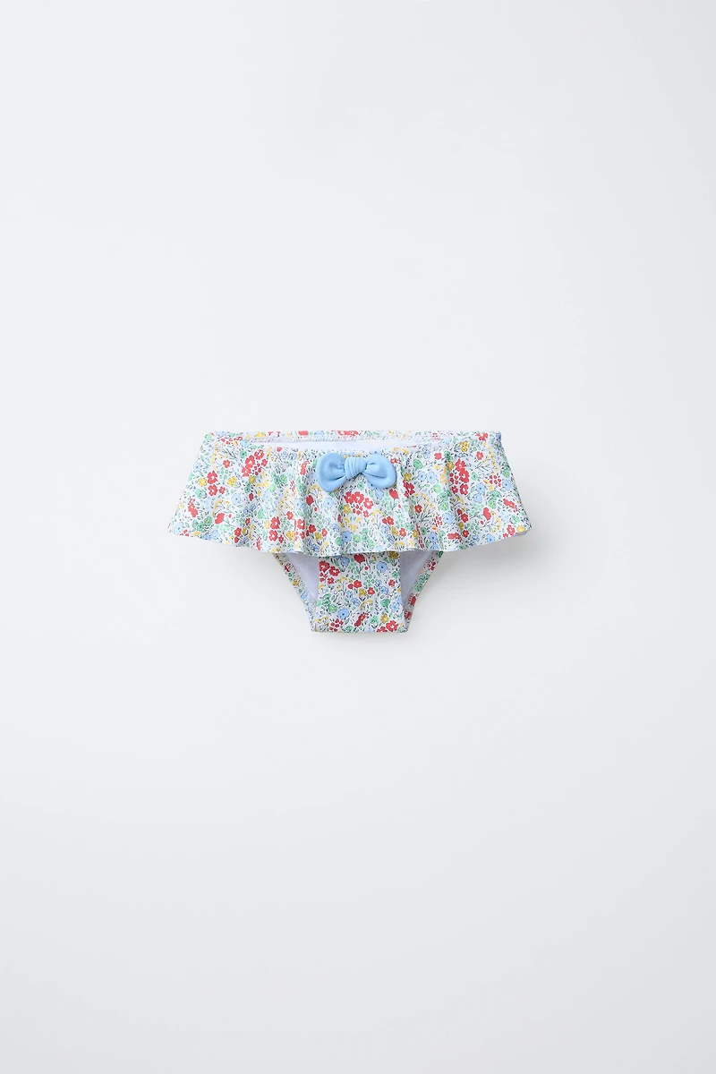 1-6 ANS/ CULOTTE À FLEURS ET VOLANTS