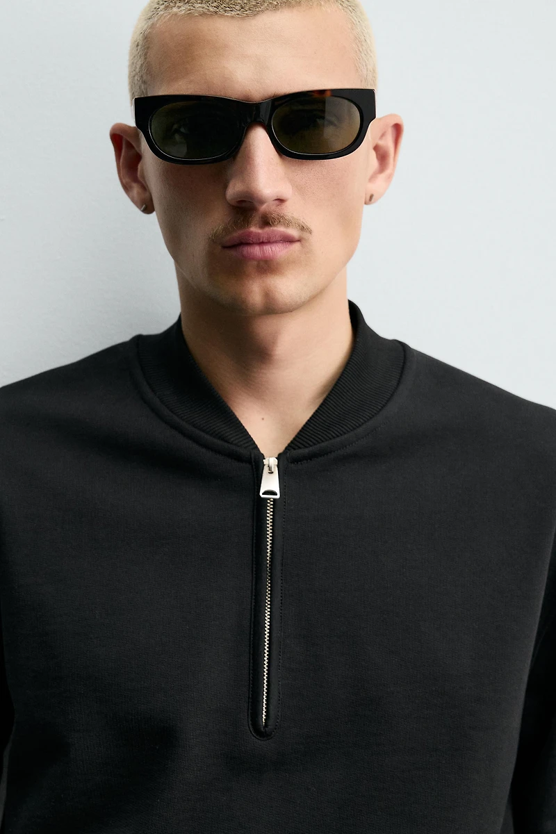 QUARTER-ZIP SWEATSHIRT