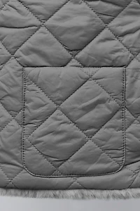 GILET RÉVERSIBLE EFFET FOURRURE