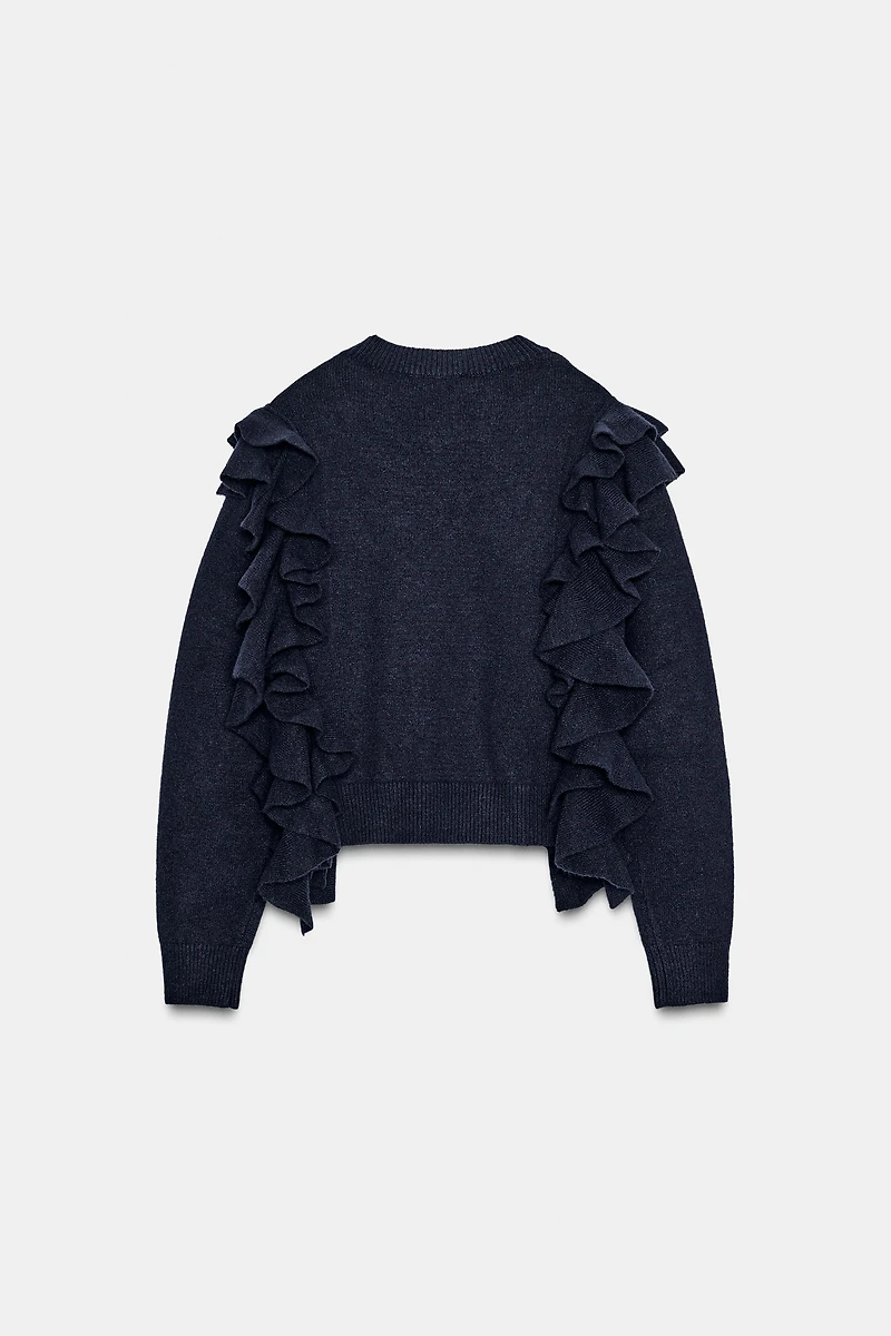 PULL EN MAILLE À VOLANTS
