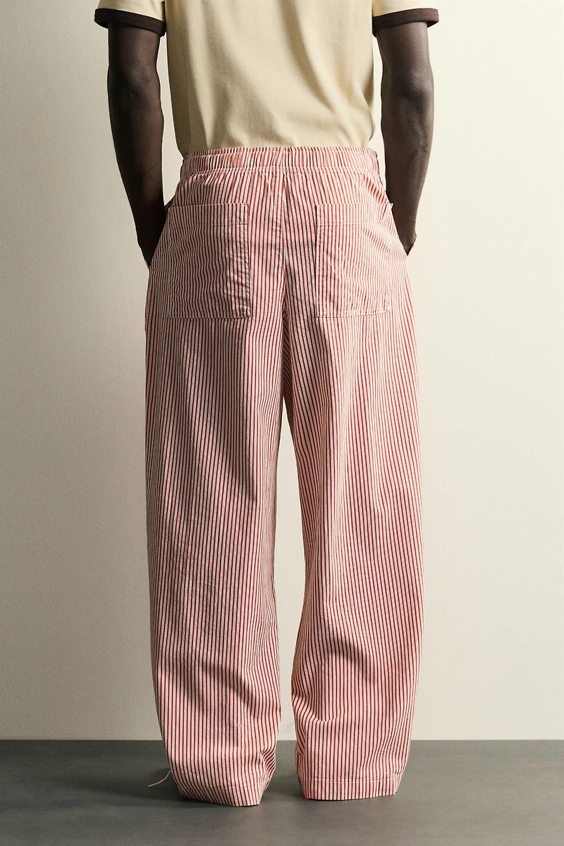 STRIPED BAGGY FIT PANTS