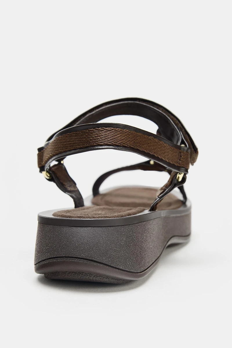 STRAPPY ADHESIVE SANDALS