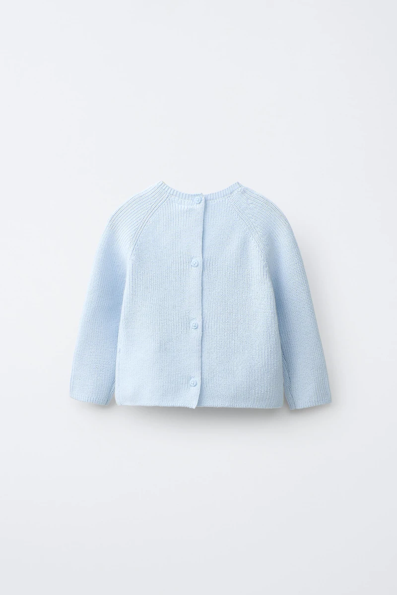 PULL EN MAILLE AVEC PIÈCE CHIOT