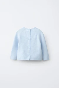 PULL EN MAILLE AVEC PIÈCE CHIOT