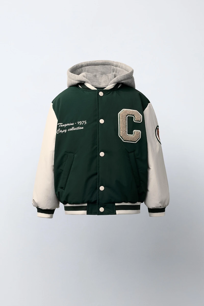 BOMBER JACKET WITH REMOVABLE HOODIE, FLEECE INTERIOR, AND NYLON CAPYBARA CAPYFUN ©