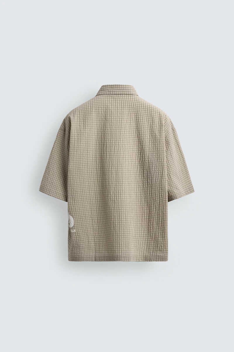 PLAID SHIRT WITH PRINTED TEXT