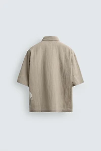 PLAID SHIRT WITH PRINTED TEXT