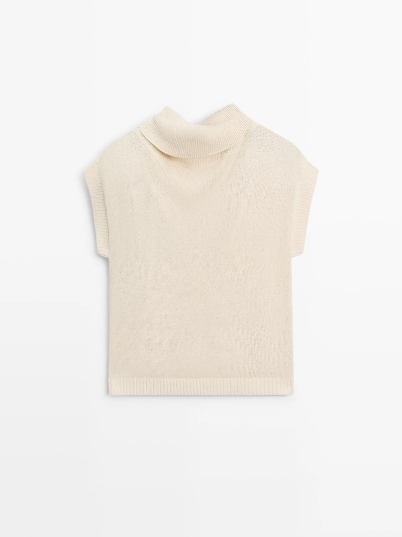 Knit sweater with low-cut back