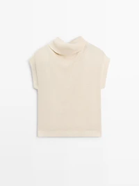 Knit sweater with low-cut back
