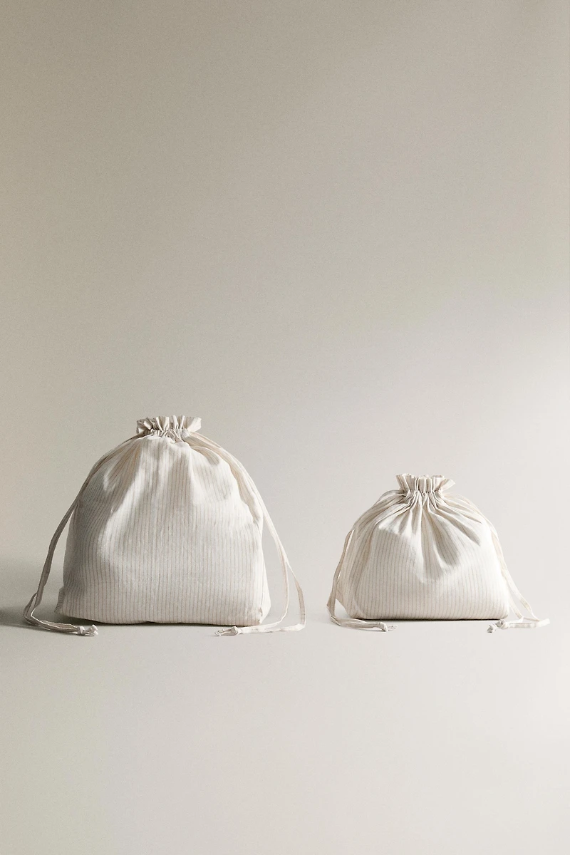 STRIPED BAG WITH DRAWSTRING CLOSURE