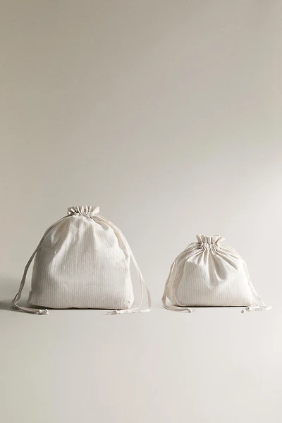 STRIPED BAG WITH DRAWSTRING CLOSURE