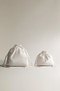 STRIPED BAG WITH DRAWSTRING CLOSURE