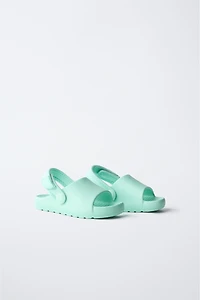RUBBERIZED SLIDES