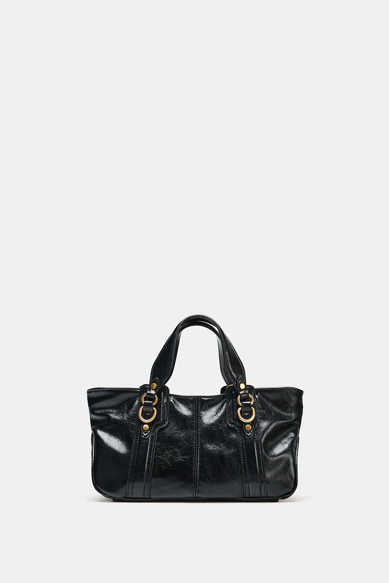 HANDBAG WITH METALLIC DETAILS