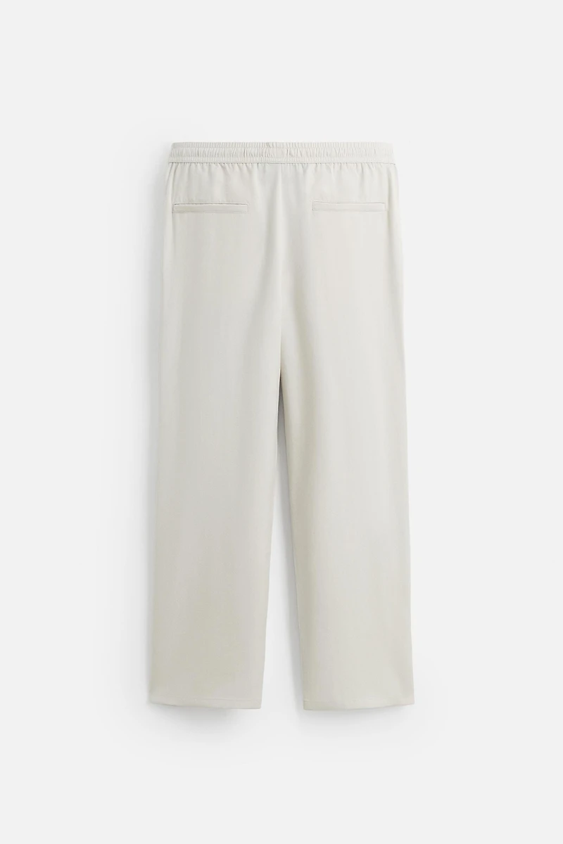 RELAXED FIT FLOWY PANTS