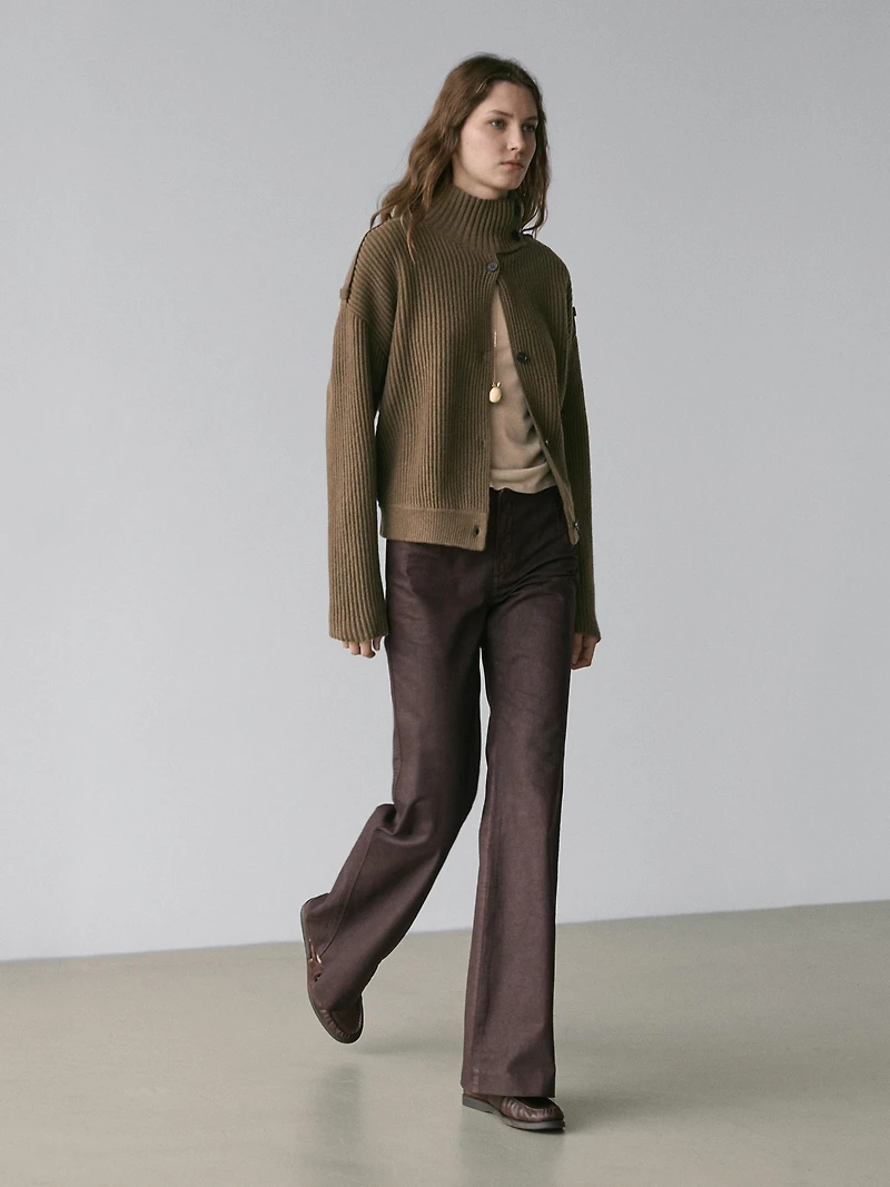 Waxed flare fit trousers