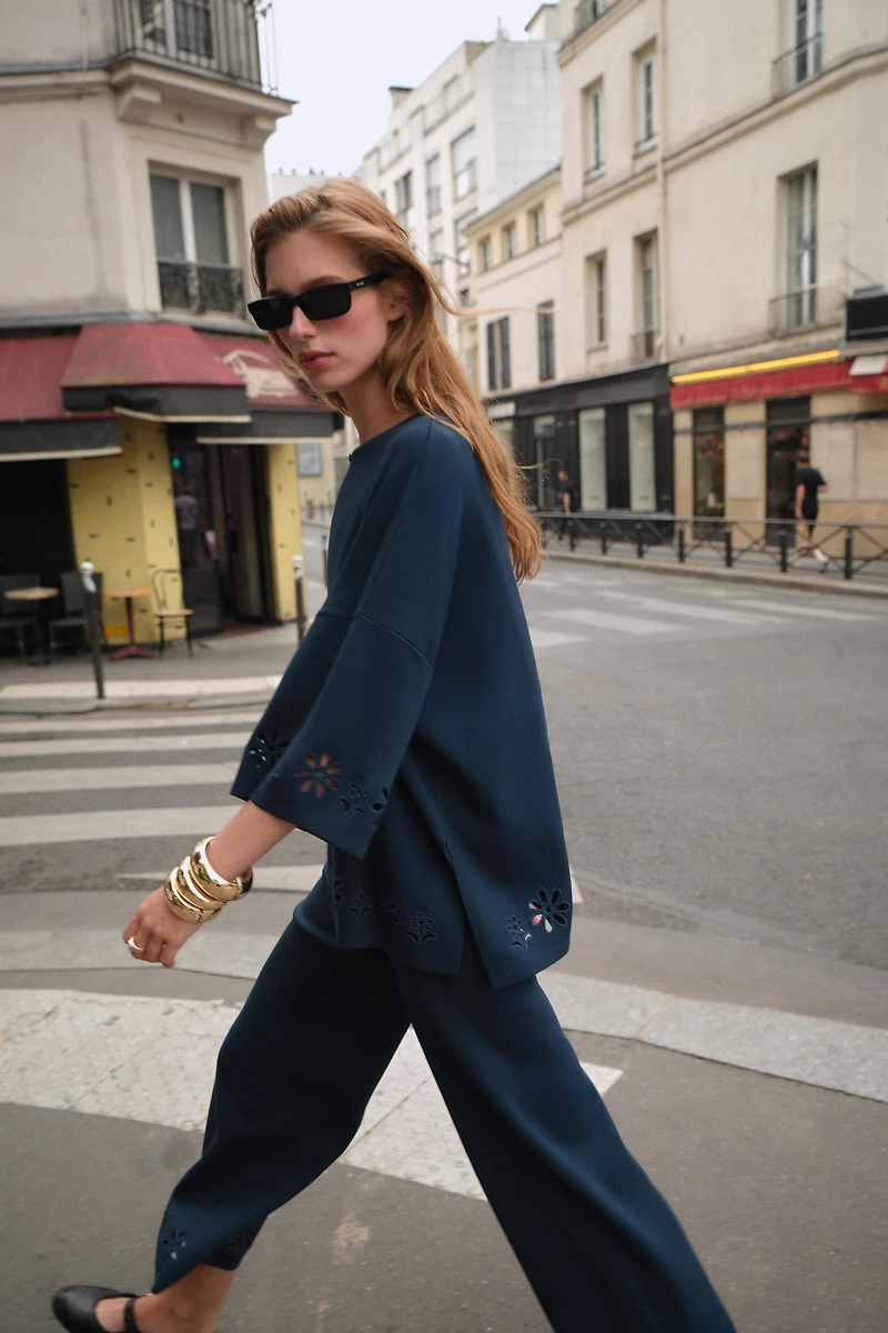 EMBROIDERED EYELET KNIT TOP