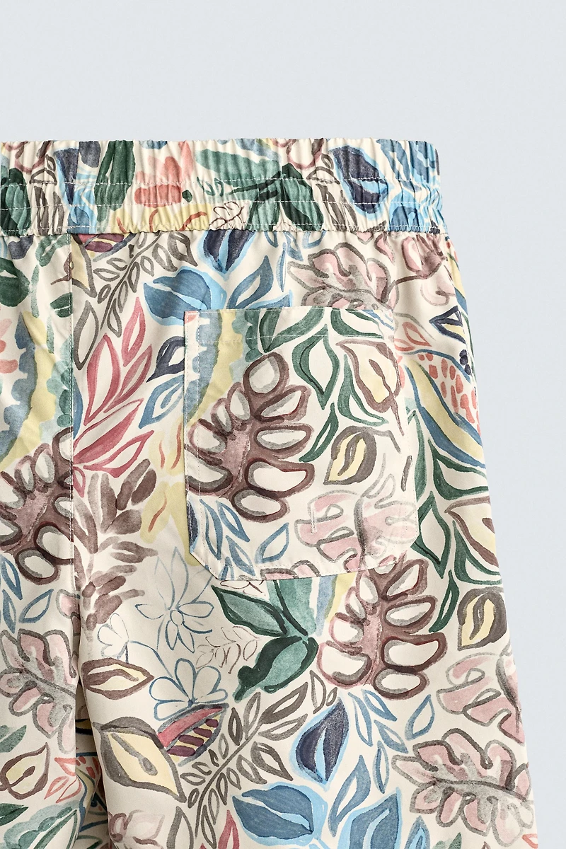 LONG FLORAL PRINT SWIM TRUNKS