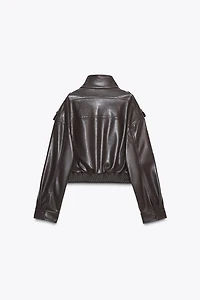 VESTE COURTE MATIÈRE SYNTHÈTIQUE