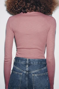 LONG SLEEVE RIBBED BODYSUIT