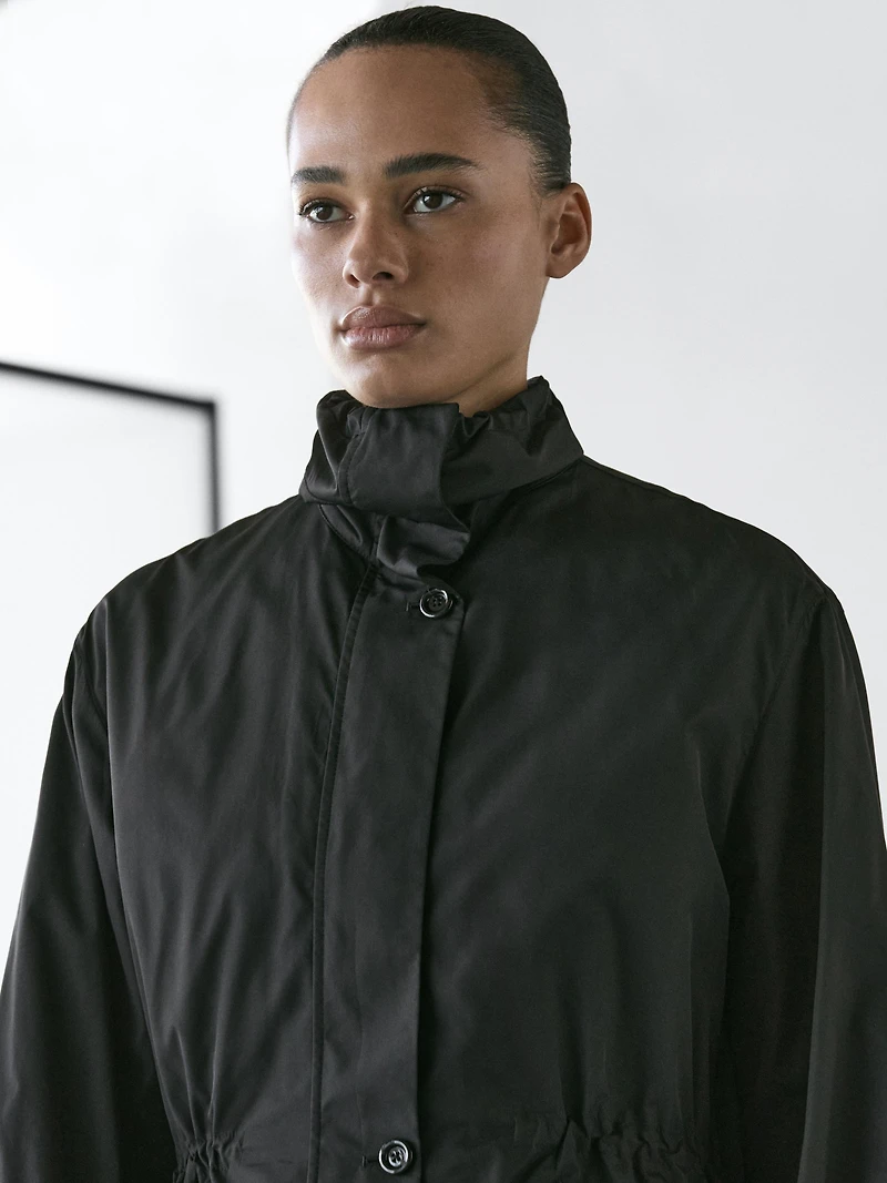 Water-repellent parka with detachable inner gilet
