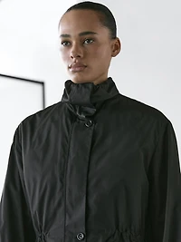 Water-repellent parka with detachable inner gilet