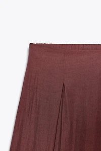 PANTALON LARGE À PINCES