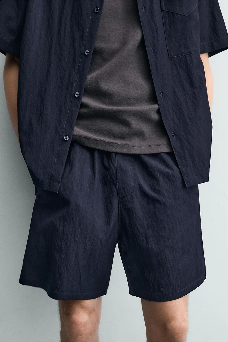 RELAXED FIT FLOWY SHORTS