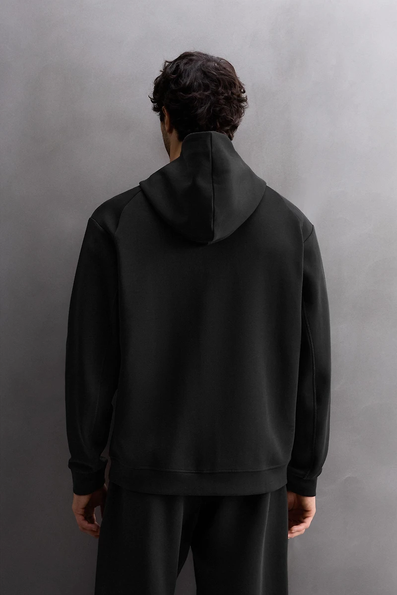 TECHNICAL ZIP-UP HOODIE