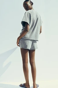 WASHED EFFECT TEXT PLUSH SWEATSHIRT