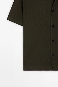 Polo en coton avec détails boutonnés