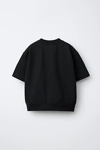 SHORT SLEEVE RAISED TEXT SWEATSHIRT