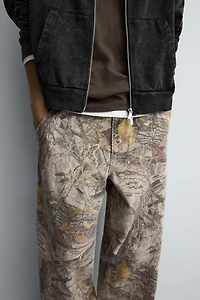 PANTALON COUVREUR IMPRIMÉ ABSTRAIT