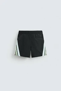 MAILLOT DE BAIN MOYEN BANDES CONTRASTÉES