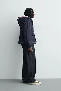 BLOUSON EN DENIM À CAPUCHE ET SURPIQÛRES