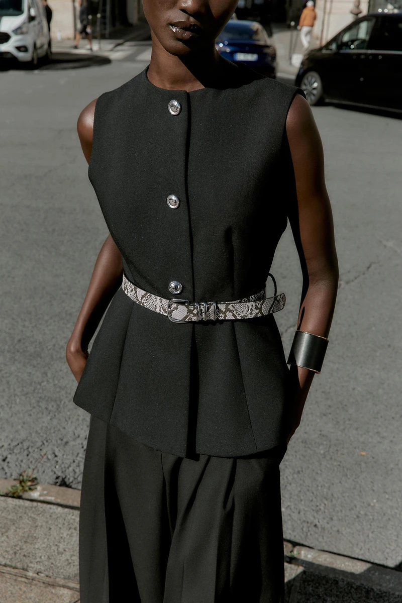 BELTED VEST