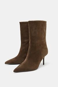BOTTINES À TALONS EN CUIR