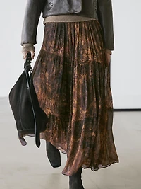 Flowing asymmetric midi skirt