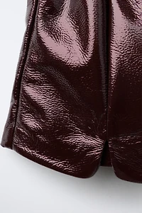 BOW PATENT LEATHER SKORT