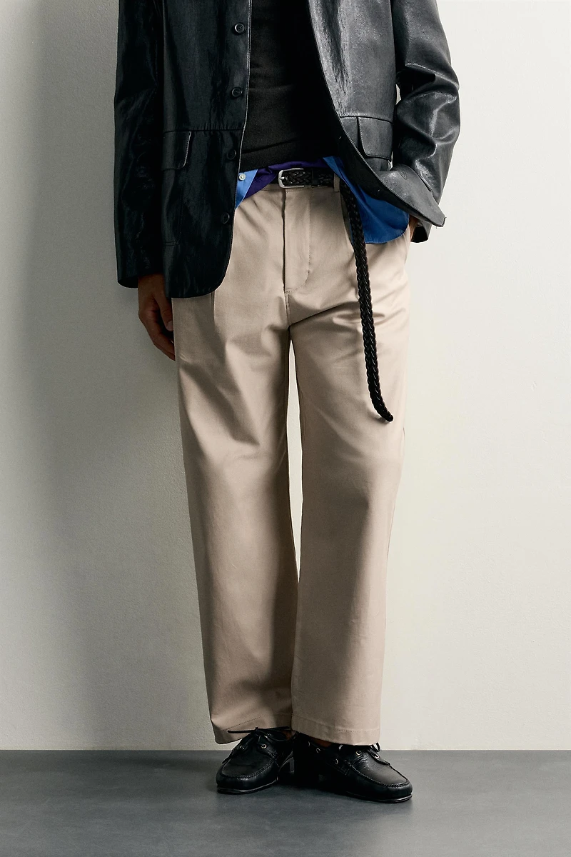 STRAIGHT FIT PLEATED PANTS